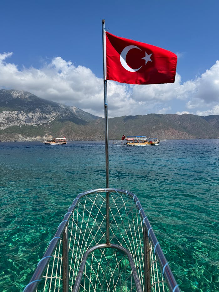 Scenic view from a boat with Turkish flag in the Mediterranean.